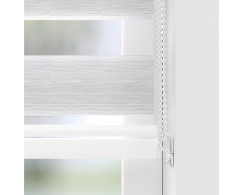 Detalj av en fönsterdekoration med kedjedrift