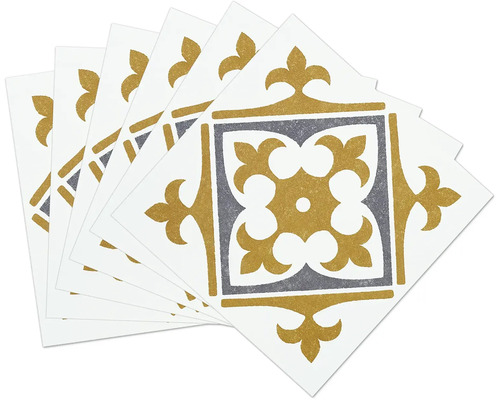 Flera kvadratiska dekorativa plattor med ett ornamentalt mönster