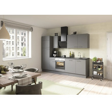 Ljust kök med grå köksdesign, matbord och köksvagn