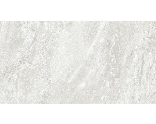 Närbild av en grå väggplatta med stenmönster