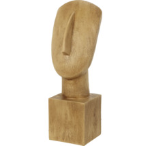 Dekorativ skulptur av ett stiliserat huvud på en piedestal