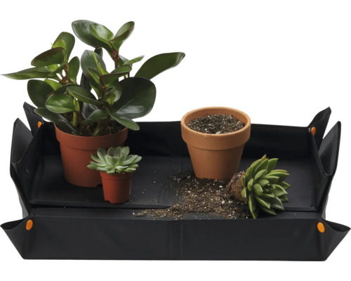 Planteringsmatta med krukväxter och planteringsjord