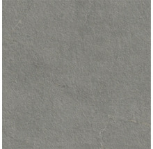 Grå golvplatta med matt yta.