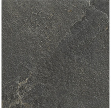 Närbild av en mörk golvplatta med stenutseende