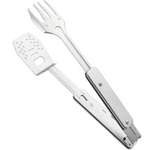 Grilltång av metall med gaffel och stekspade