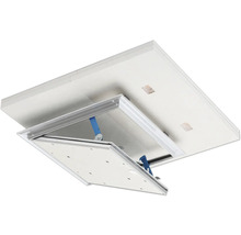 Öppnad inspektionslucka med synligt lås