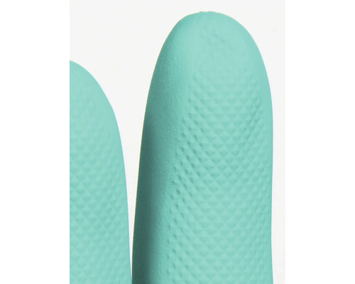 Närbild av en skyddshandske med texturerad yta