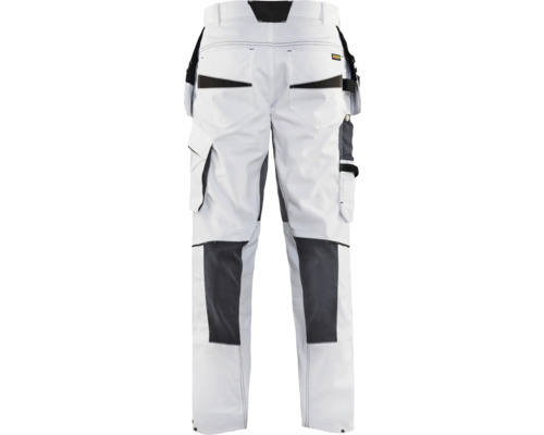 Vita arbetsbyxor med fickor och förstärkta knän bakifrån