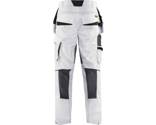 Vita arbetsbyxor med fickor och knäskydd