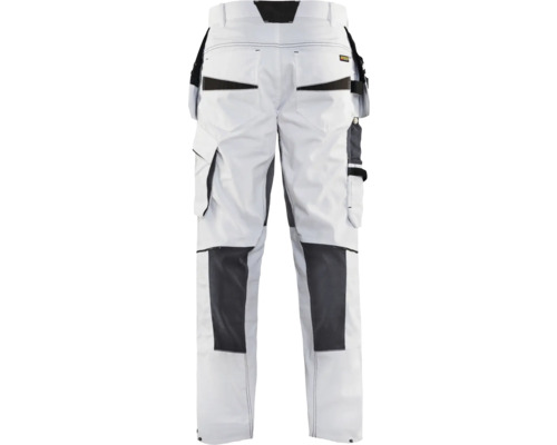 Vita arbetsbyxor med fickor och knäförstärkning, bakifrån