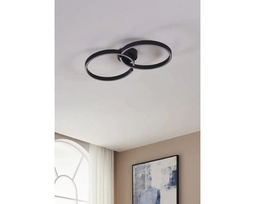 Modern taklampa med två sammanflätade ringar