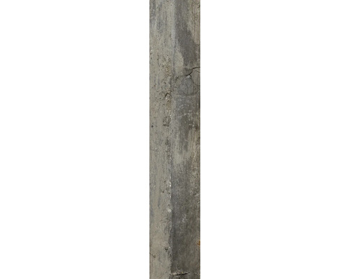 Närbild av en grå väggpanel med betonglook.
