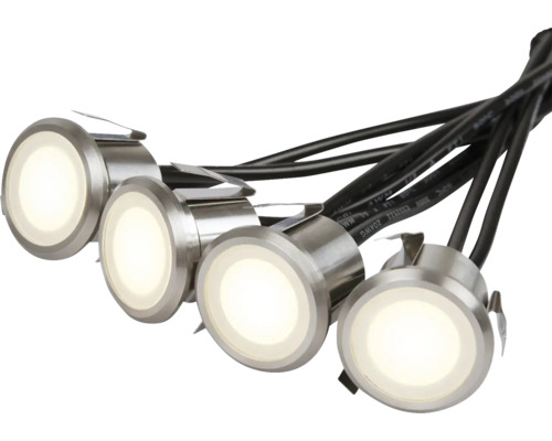 Fyra runda LED-markspottar med kablar.