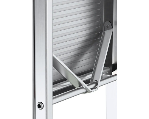 Detaljvy av en hopfällbar torkställning i rostfritt stål.