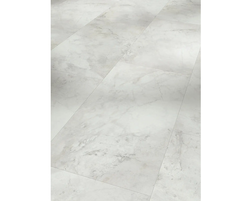 Närbild av vinylgolv med marmorutseende.