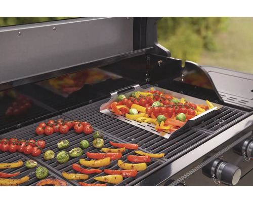 Grönsaker tillagade på en grill