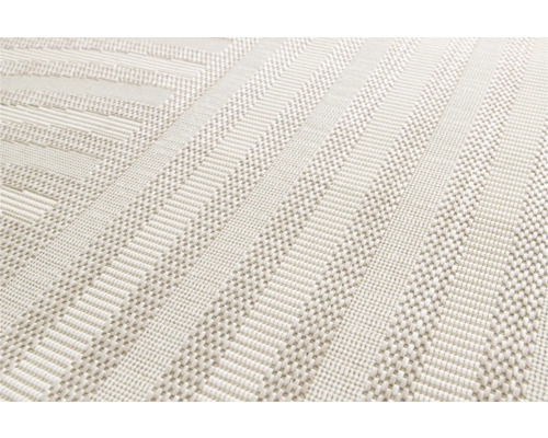 Närbild av en strukturerad tapet med geometriskt mönster