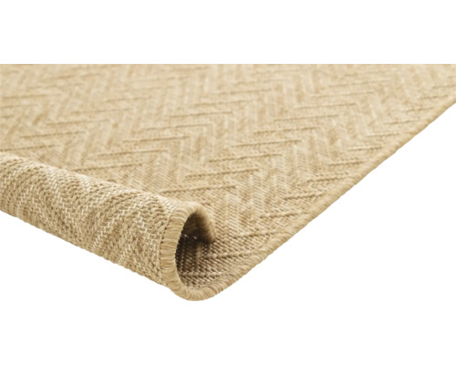 Matta med sicksackmönster, delvis rullad