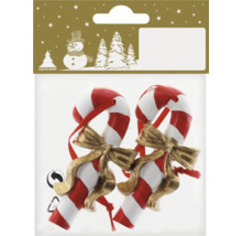 Två polkagrisar med rosett för juldekoration