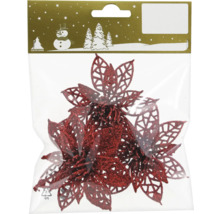 Förpackning med röda, glittriga julstjärnehängen för dekoration