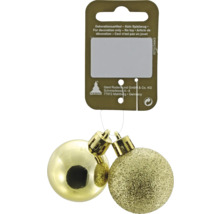 Gyllene julgranskulor på galge