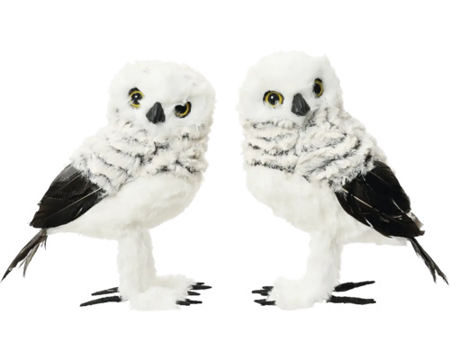 Två dekorativa vita ugglafigurer