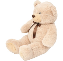 Sittande teddybjörn med rosett