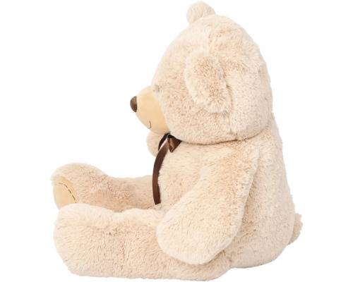 Nallebjörn i plysch med rosett i profil