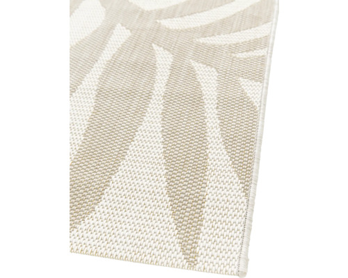 Detaljvy av en utomhusmatta med växtmönster