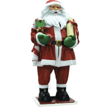 Dekorativ jultomtefigur med present och mistel