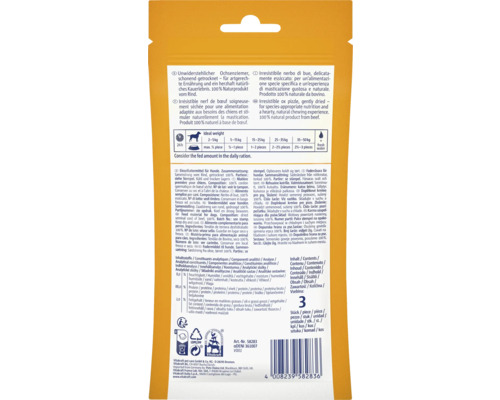 Baksidan av en förpackning Vitakraft-nötkött för hundar med utfodringsrekommendationer och ingredienser.