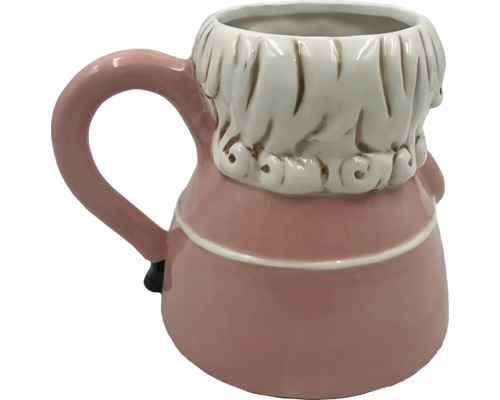 Keramisk mugg i form av en figur med ett handtag
