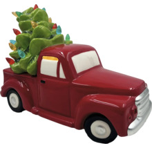 Dekorativ röd pickup-figur med julgran på flaket