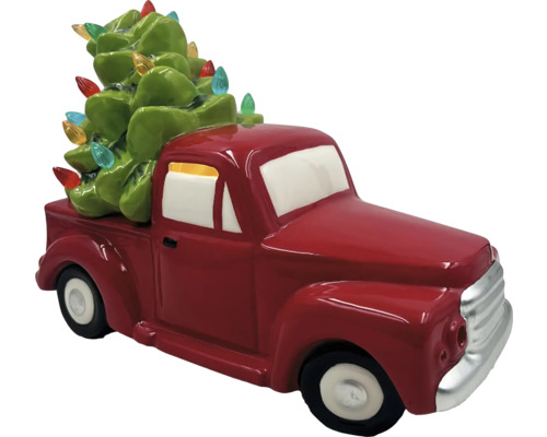 Dekorativ röd pickup-figur med julgran på flaket