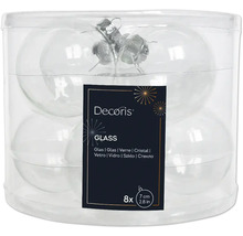 Åtta genomskinliga julgranskulor i glas, vardera sju centimeter stora, i en genomskinlig förpackning.