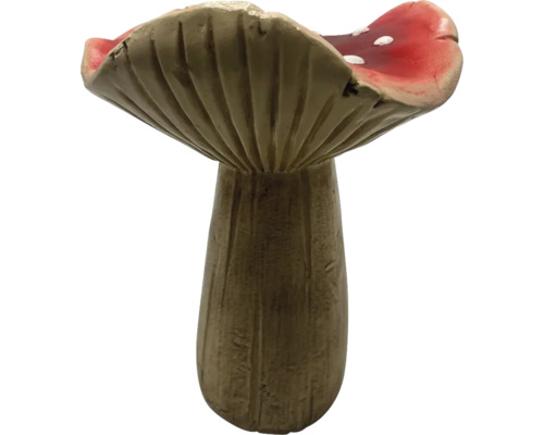 Dekorativ svamp med röd hatt och vita prickar för trädgården