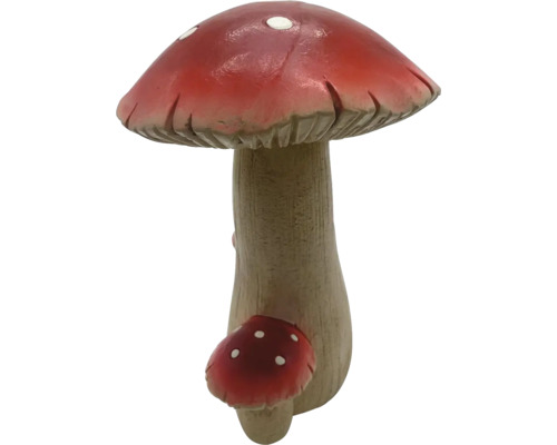 Dekorativ svamp med röd hatt och vita prickar för trädgården