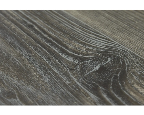 Närbild av en mörk trästruktur