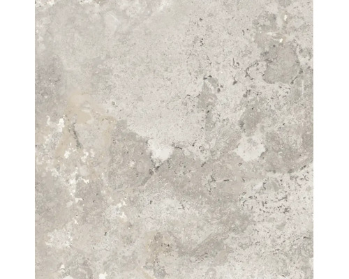 Närbild av en kvadratisk golvplatta med stenmönster