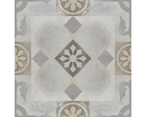 Dekorativ golvplatta med geometriska och blommiga mönster