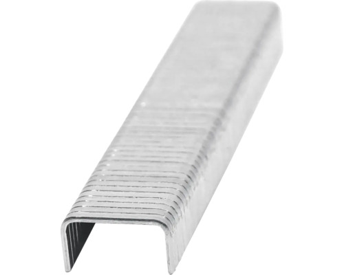 Närbild av en rad häftklamrar för en häftpistol.