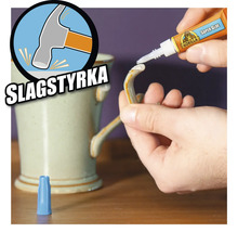 Superlim appliceras på en trasig keramikmugg. Symbol för slagtålighet.