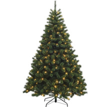 Konstgjord julgran med belysning på ett stativ