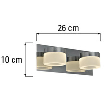 Vägglampa med måtten: 26 centimeter bred och 10 centimeter hög