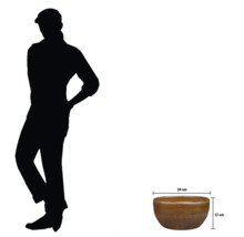 Dekorativ planteringsskål som mäter 34 cm gånger 17 cm.