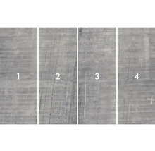 Närbild av fyra betongplattor med olika ytstrukturer