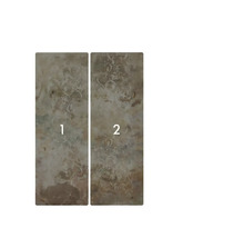 Två dekorativa plattor med blommönster.