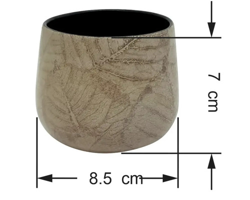 Keramikytterkruka med bladmönster, höjd 7 centimeter, bredd 8,5 centimeter.