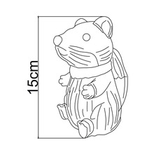 Dekorationsfigur hamster med en höjd på 15 centimeter.