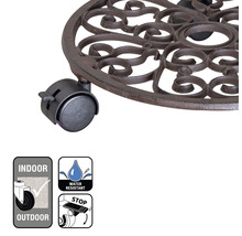 Växtrullare av metall med hjul och dekorativa ornament